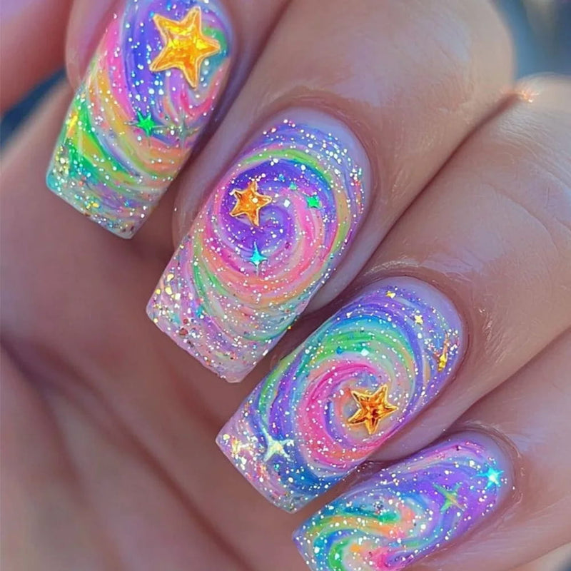 Glittery rainbow galaxy press on nails in dreamy pastel colours
